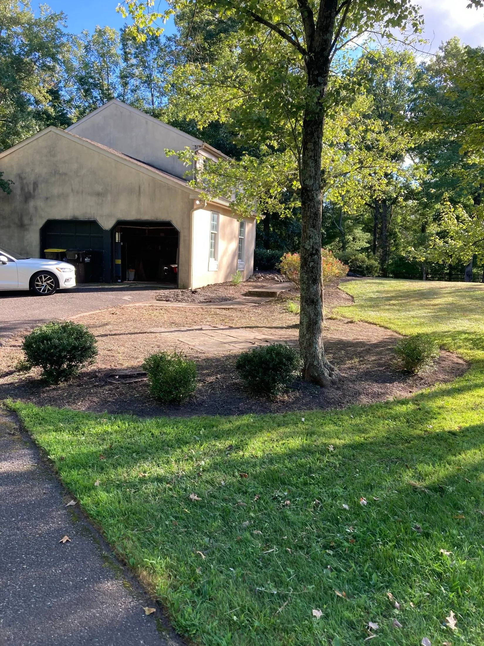 Chester County home with lawn and landscape beds